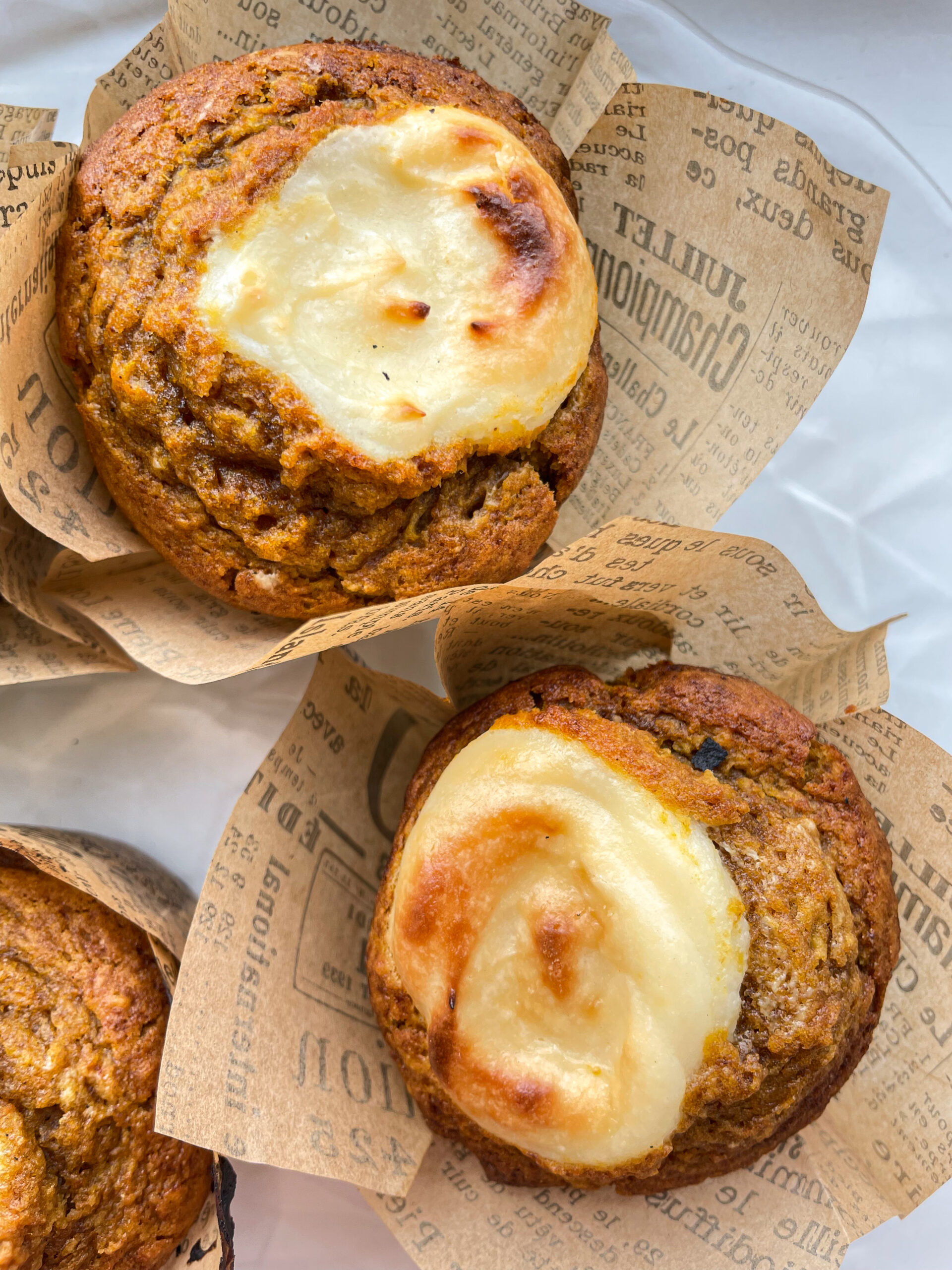 Muffins with cream cheese topping